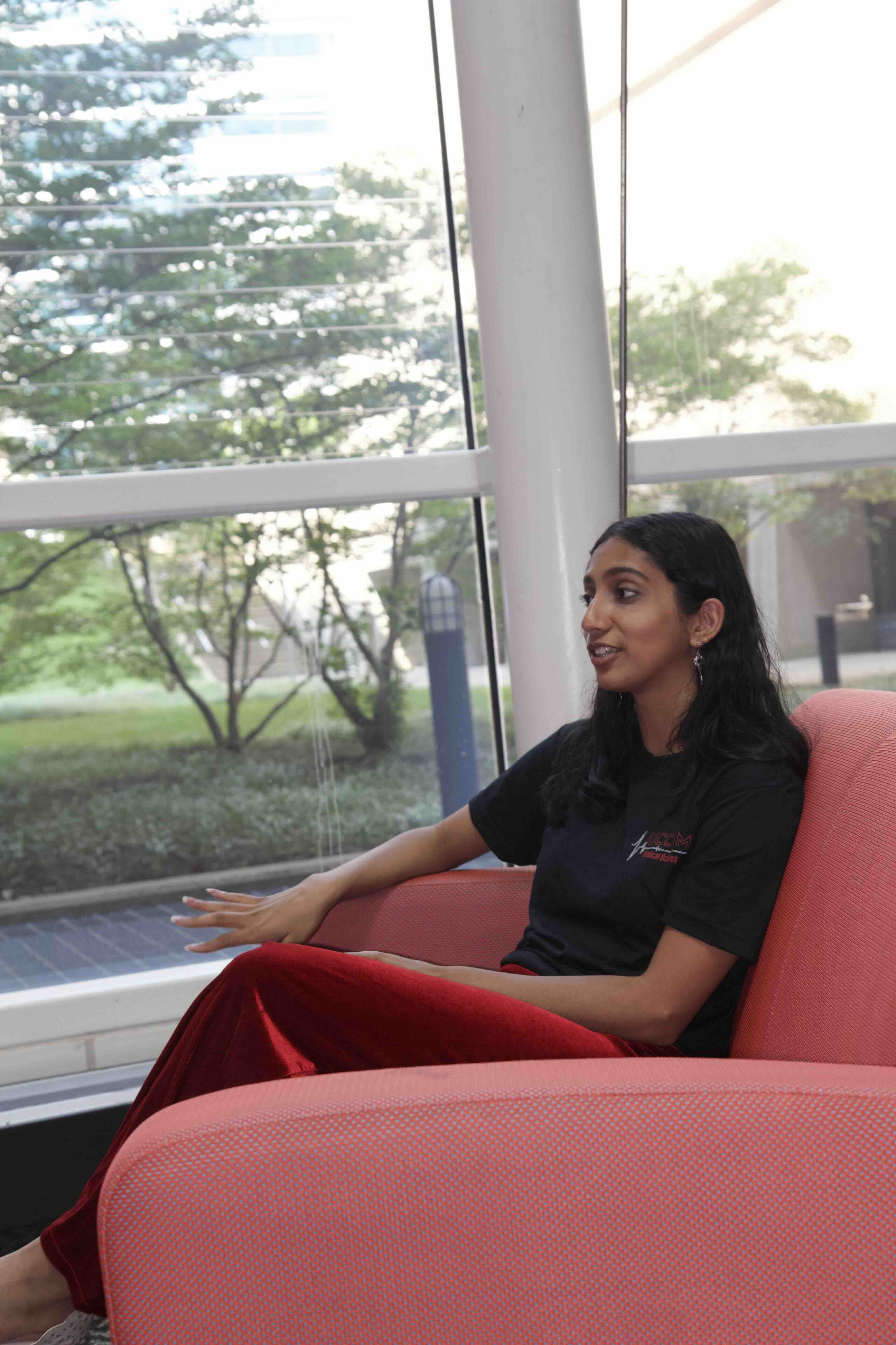 Simhya in chair.