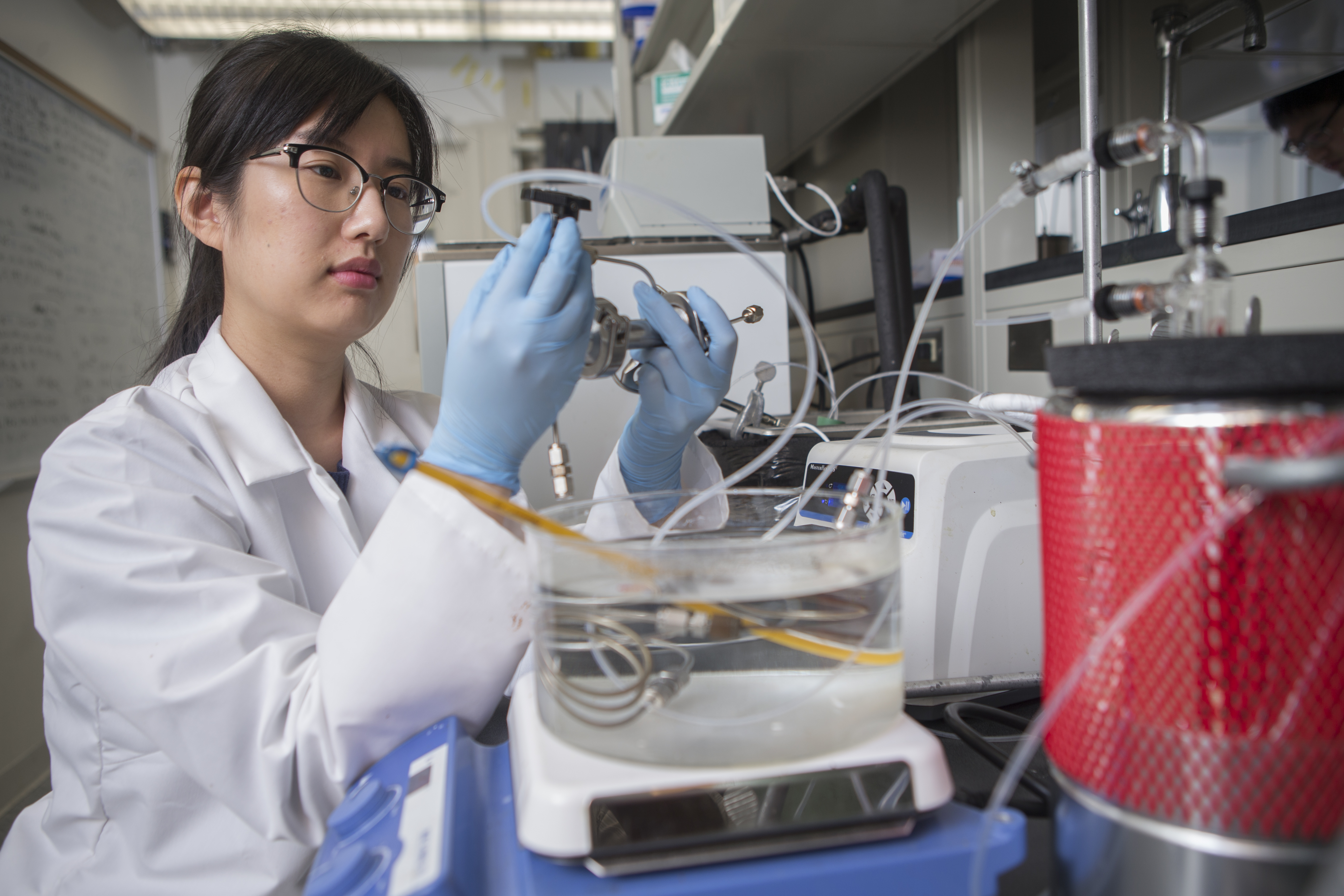 University of Cincinnati Engineering student works in a lab