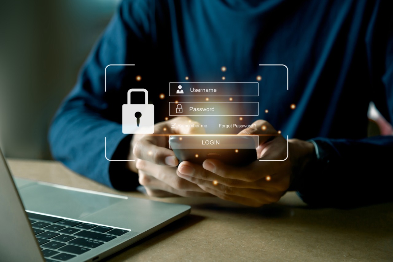 Illustration of a password lock over a laptop.