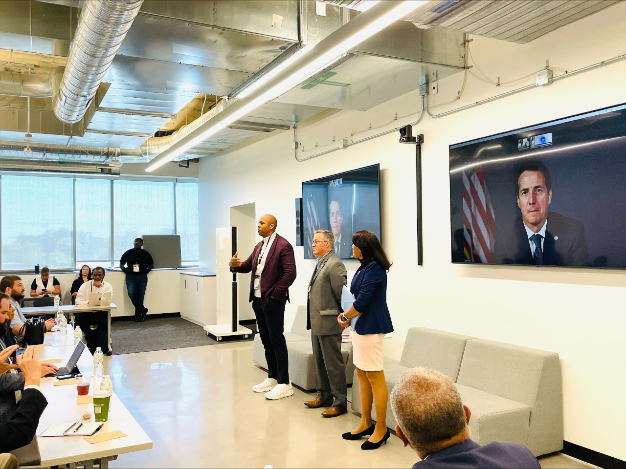 Sen. Bernie Moreno on big screen during policy luncheon
